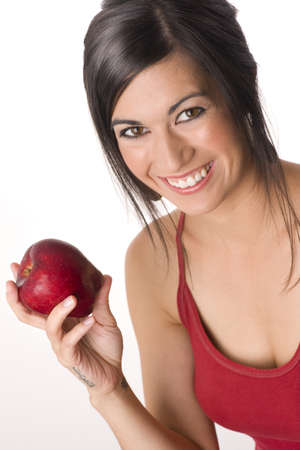Beautiful Brunette with Appleの写真素材