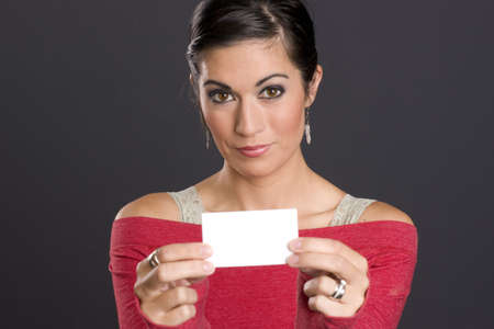 Pretty Woman holding a business card