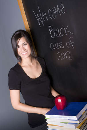 Pretty Teacher Accepts an Appleの写真素材
