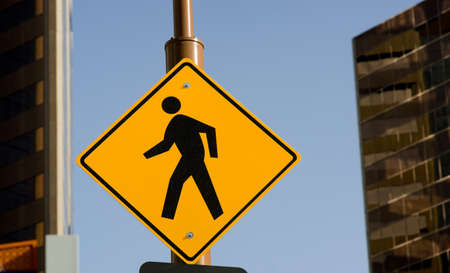 Pedestrian Crossing Sign on the street cornerの写真素材