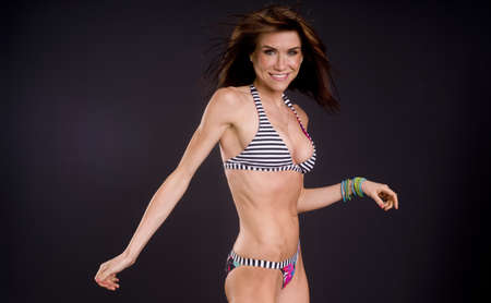 A pretty brunette Rachel Parker strikes a pose in her bikiniの写真素材