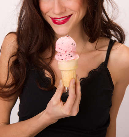 An Active and Attractive woman eating Ice Creamの写真素材