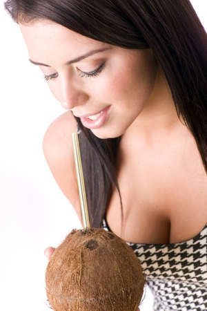 An attractive woman Drinking Coconutの写真素材
