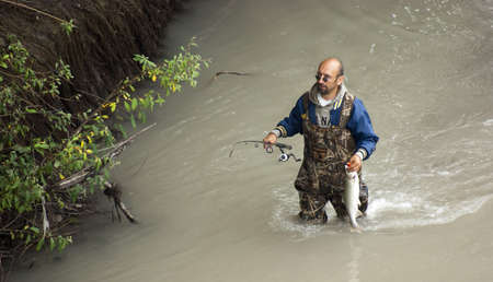 Fishing season is open in Western Washington for and the Salmon are running, this man just caught...