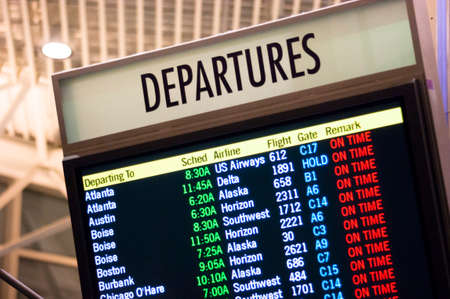 Larger than Life Size Depature Schedule Sign at Local Airport Flight Centerの写真素材