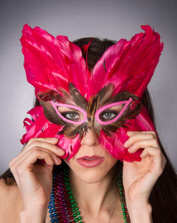 Attractive Brunette Woman Gypsy Costume Feathered Face Mask Fashion Modelの写真素材