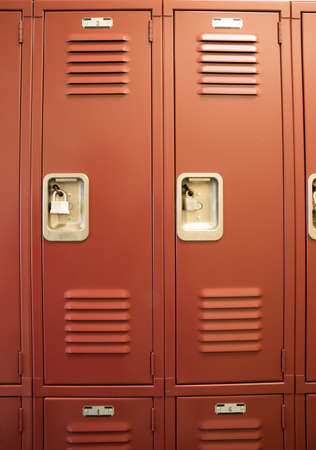 A row of locked starage lockers vertical compositionの写真素材