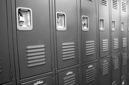 A row of locked starage lockers horizontal compositionの写真素材