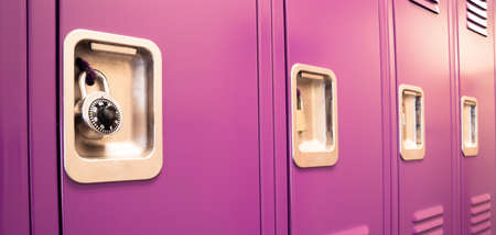 A row of locked starage lockers horizontal compositionの写真素材