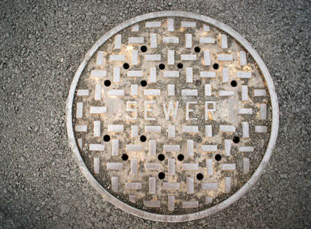 a manhole sewer coverの写真素材