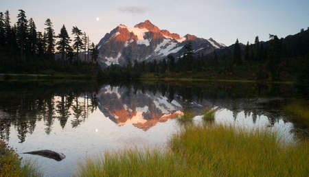 Mount Shuksan refelcted in Picture Lake at sunset.の写真素材