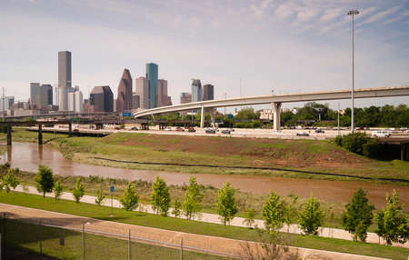 Green beltway under perfect Houston downtown city skylineのeditorial素材