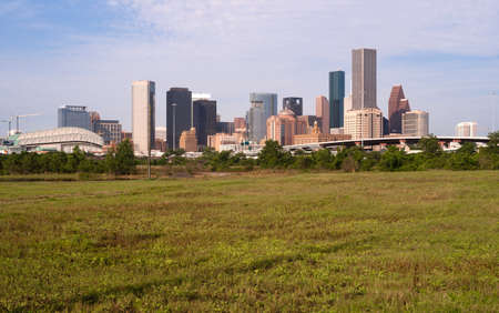Green beltway under perfect Houston downtown city skylineのeditorial素材