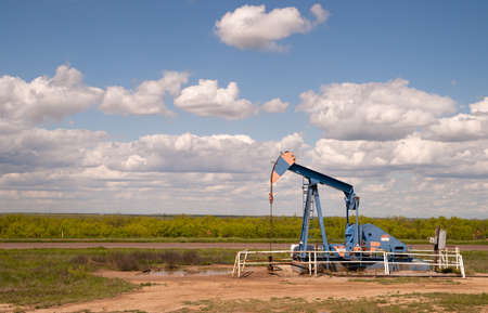 Texas Oil Pump Jack Fracking Crude Extraction Machineの写真素材