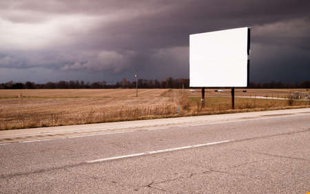 A thuderstorm passes as the billboard advertises nothingの写真素材
