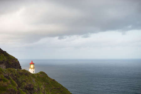 This lighthouse sends a beam of light out to the Pacific Ocean for miles awayの写真素材