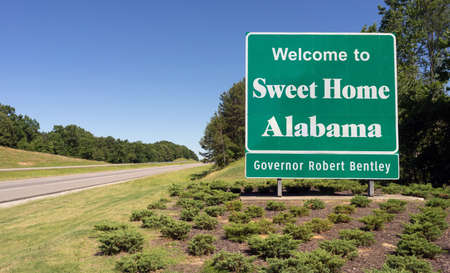 A large welcome sign along the interstate heading into Sweet Home, Alabamaの写真素材