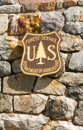 Rock wall mounted US Forest Service signのeditorial素材