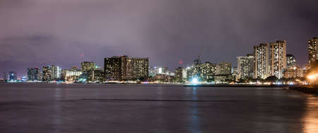 A storm passes over Waikiki and the Pacific Oceanの写真素材