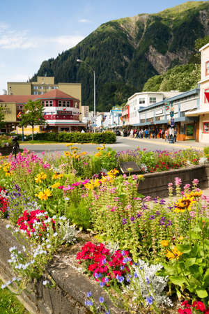 JUNEAU, ALASKA/UNITED STATES â AUGUST 5: Tourists walk the street in downtwon towards the end of the summer season on 08/05/2015 in Juneau, AK.のeditorial素材