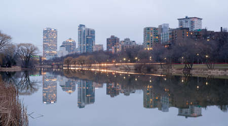 MILWAUKEE, WISCONSIN/UNITED STATES â APRIL 1: Most of the cities residents sleep as the sun comes up on the downtown waterfront from Veteran's Park on 03/30/2017 in Milwaukee, WI.のeditorial素材