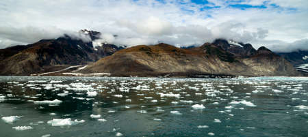 The Aialik Glacier flows in to a bay of the same name drains the Harding Ice Fieldの写真素材