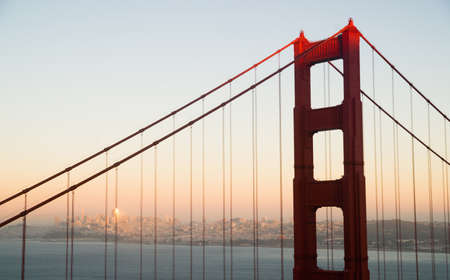 landmark; bridge; architecture; tourist; travel; bay; suspension; structure; ocean; sky; water; usa; blue; urban; california; tower; orange; pacific; tourism; sunset; red; transportation; famous; attraction; golden gate; america; coast; american; transporの写真素材