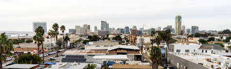 Palm trees and buildings are dense in the south end of San Diego Californiaの写真素材