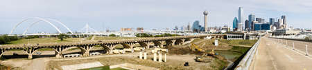 Bridges traverse the river and lead commuters into Dallas Texasの写真素材