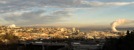 Winter blue sky appears at sunrise viewed from a hill in Tacoma Washington