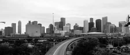 Elevated highways come and go from the urban landscape of Houston Texasの写真素材