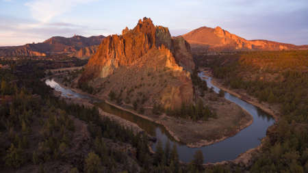 The sun is setting on Smith Rock in Central Oregon's high desertの写真素材