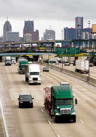 Big Rigs frequent the highways in and around Detroit Michigan in a vertical composition