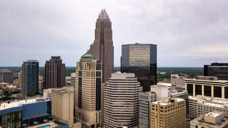 Overcast skies cover the urban center that is Charlotte, North Carolinaの写真素材