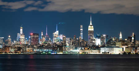 The Empire State building is not as prominent as it once was in the growing city skyline of New York Cityの写真素材