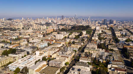 Blue skies on a clear sunny afternoon over the homes and neighborhoods of San Franciscoの写真素材