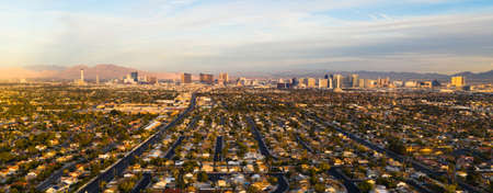 Aerial view of the entire length of Las Vegas Strip with surrounding homes and retail spaceの写真素材