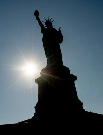 It's a cutout on blue of lady liberty in the Statue of Libertyの写真素材