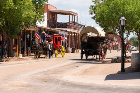 Main Street in Tombstone on a summer day the street blocked off from vehicles to accommodate Horses...