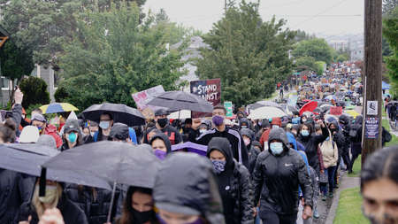Seattle, WA/USA â June 12: Street View Silent Protesters March for George Floyd 60,000 strong in Seattle to Jefferson Park on June 12, 2020のeditorial素材