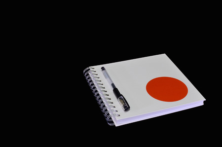 Isolated of white notebook with penの写真素材