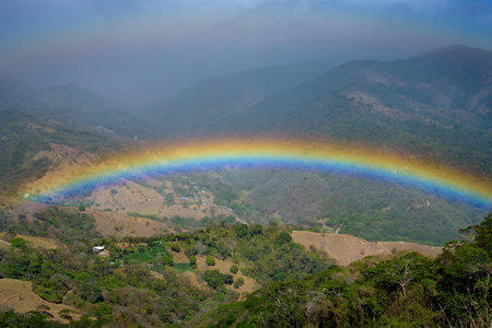 Rainbow over the mountains, Doi Inthanon National Park, Chiang Mai, Thailandの写真素材