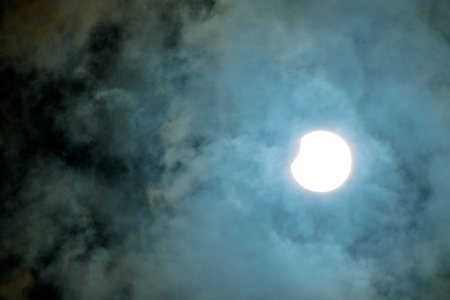 Blue sky with clouds and full moon. Natural background. Space for text.の写真素材