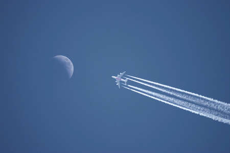Plane flying to moon