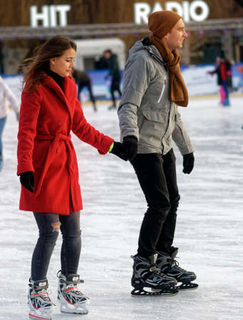 Couple on ice skating rink