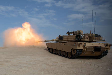 U.S. Marines with Charlie Company, 1st Tank Battalion, 1st Marine Division, conduct live-fire...