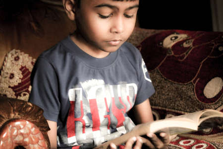 Young Boy Studying