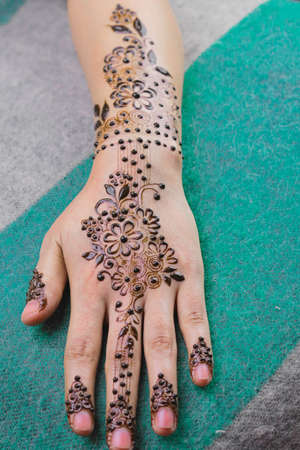 Mehndi Design on Forearm and Fingers