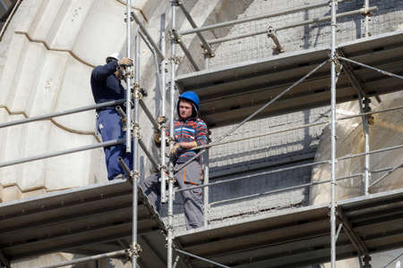 Workers on scaffolding
