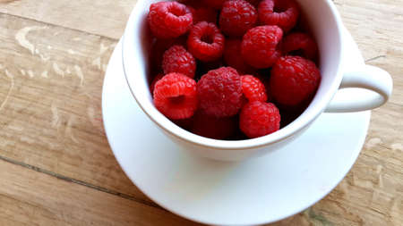red, rasberries, fruits, food, eat, cup, mug, wood, table, breakfast, healthy